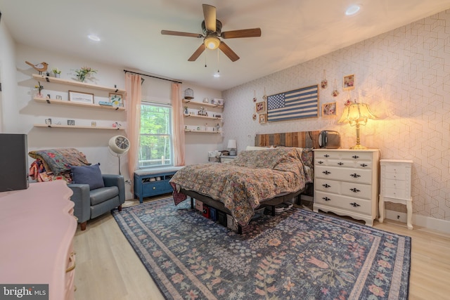 bedroom featuring ceiling fan and light wood-type flooring