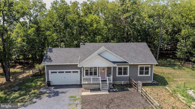 view of front of house featuring a garage and a front yard