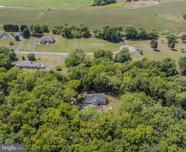 birds eye view of property featuring a rural view