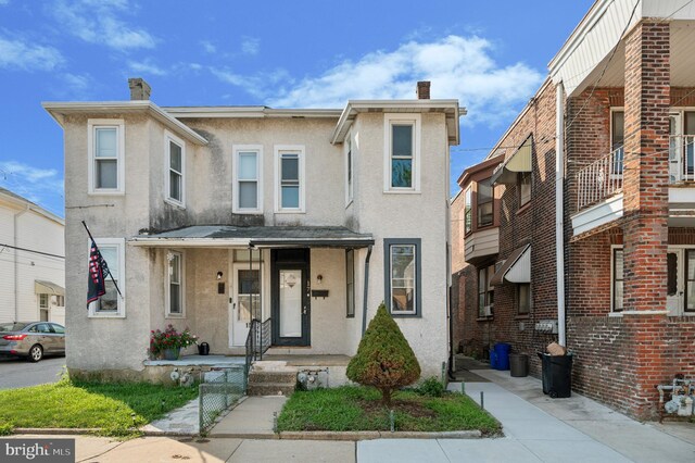 townhome / multi-family property featuring a balcony