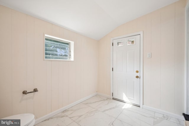 interior space featuring vaulted ceiling