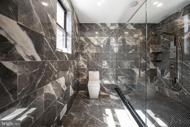 bathroom with tile walls, walk in shower, toilet, and tile patterned flooring