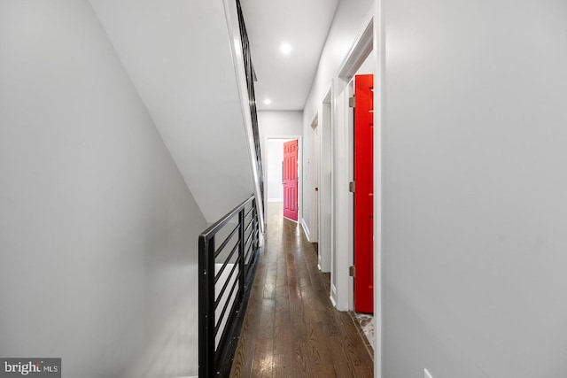 hallway featuring dark hardwood / wood-style flooring