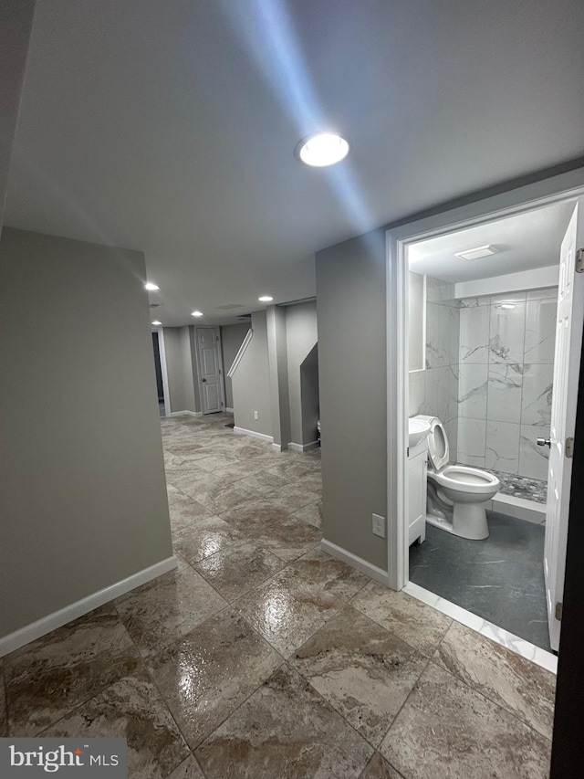 corridor featuring tile patterned flooring