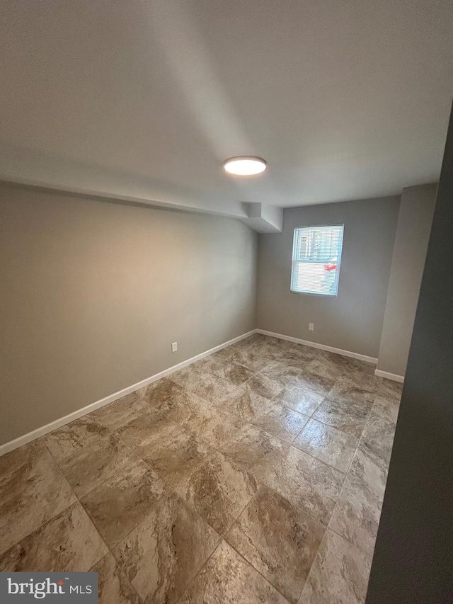 spare room with tile patterned flooring