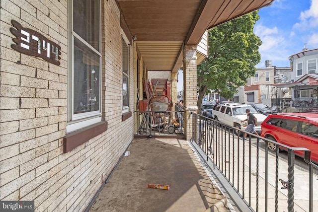 balcony featuring a porch