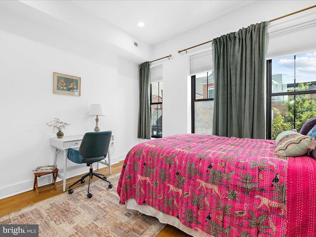 bedroom featuring wood-type flooring