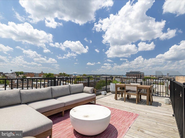 wooden deck featuring outdoor lounge area