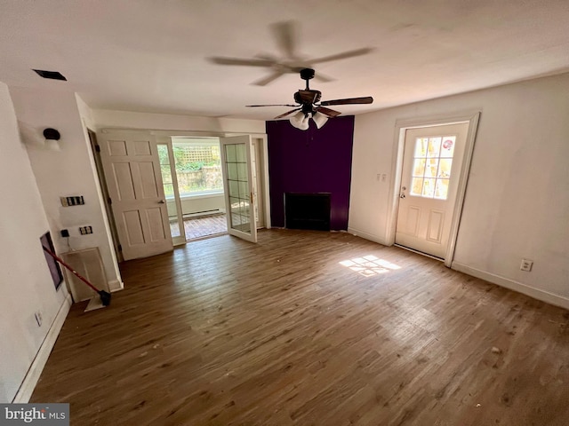 entrance foyer featuring wood finished floors, baseboards, and ceiling fan