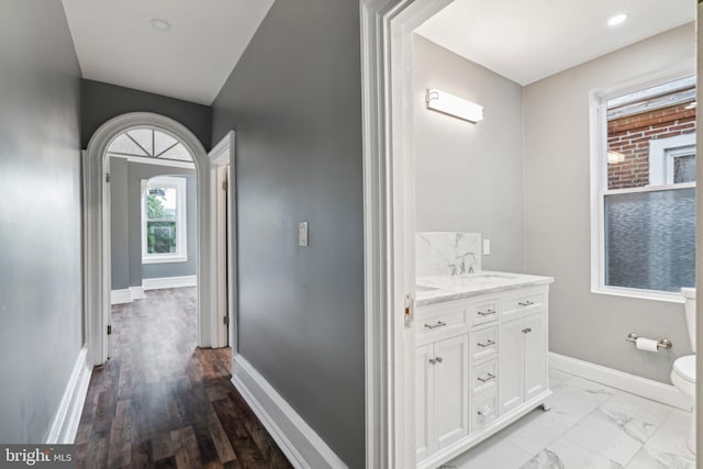 bathroom with vanity and toilet