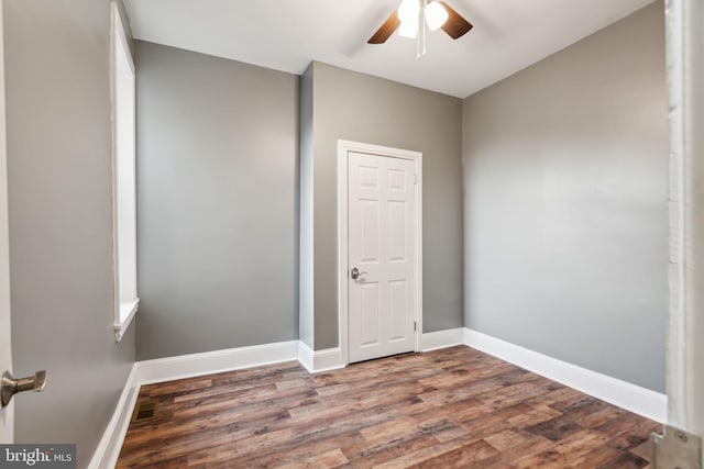 unfurnished room featuring ceiling fan and wood-type flooring