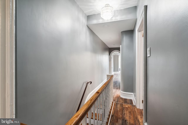 hall with dark hardwood / wood-style flooring