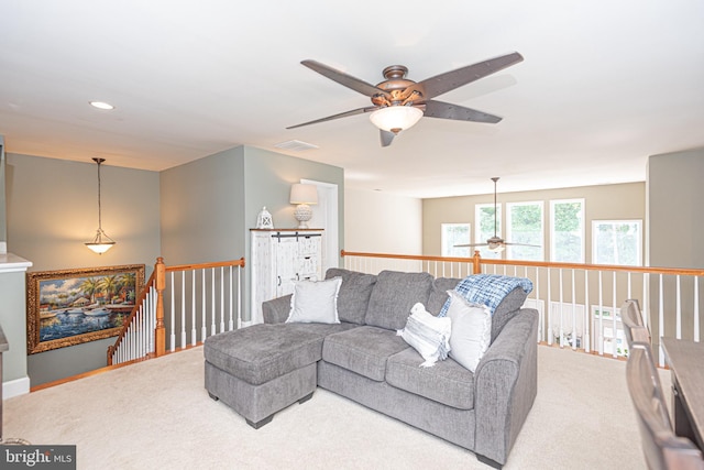 living room with carpet, visible vents, and recessed lighting