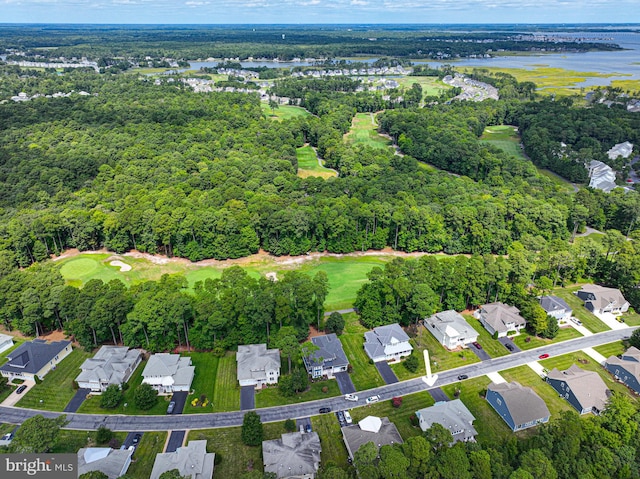 birds eye view of property with a water view and a residential view