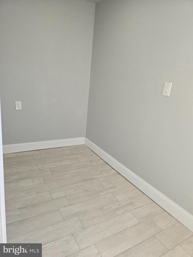 empty room featuring light hardwood / wood-style floors