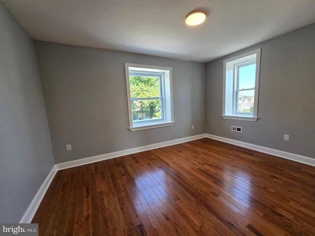 basement with wood-type flooring