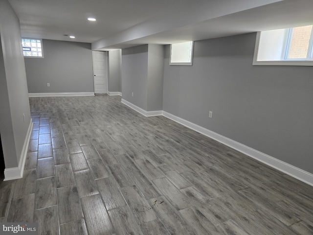 basement featuring hardwood / wood-style floors