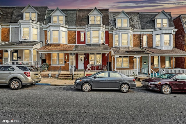 multi unit property featuring covered porch