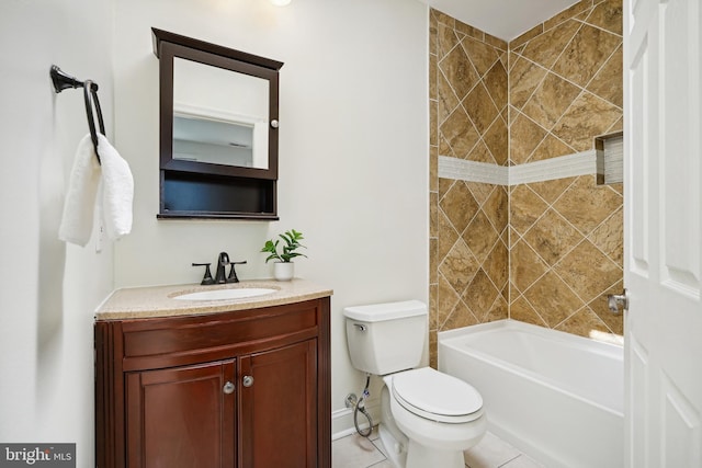 full bathroom featuring tiled shower / bath, vanity, toilet, and tile patterned flooring