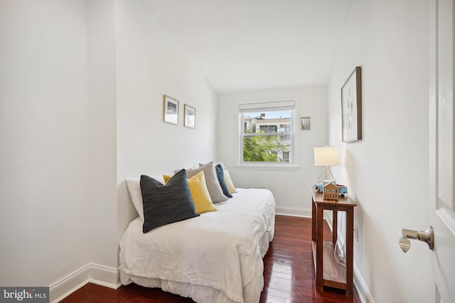 bedroom featuring dark hardwood / wood-style floors