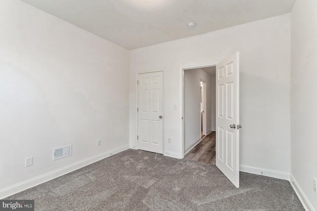 unfurnished bedroom featuring carpet flooring