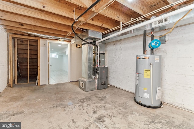 basement with heating unit and water heater