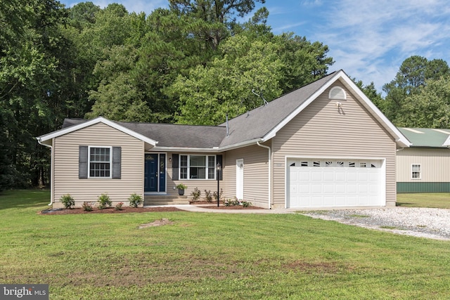 ranch-style house with a front lawn and a garage