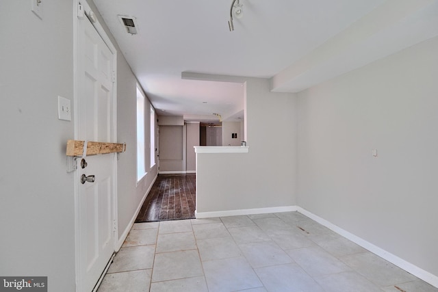 interior space with light tile patterned floors