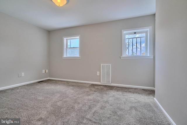 view of carpeted spare room