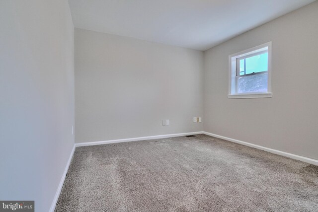 unfurnished room with carpet