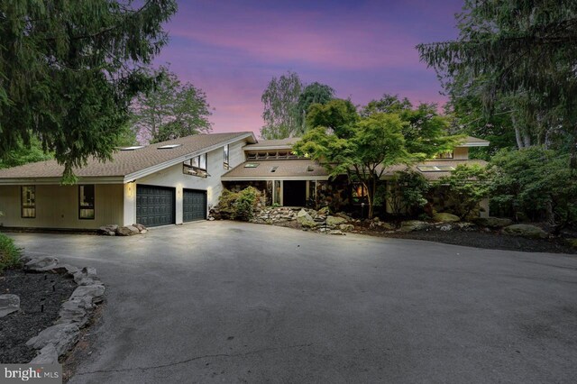 view of front of property with a garage