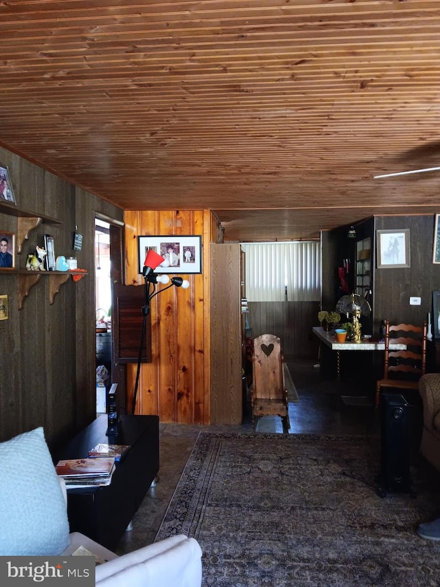 living room featuring wood walls