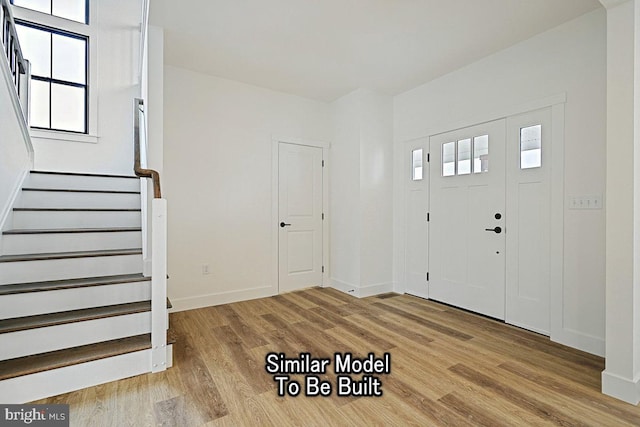 entrance foyer featuring light wood-type flooring