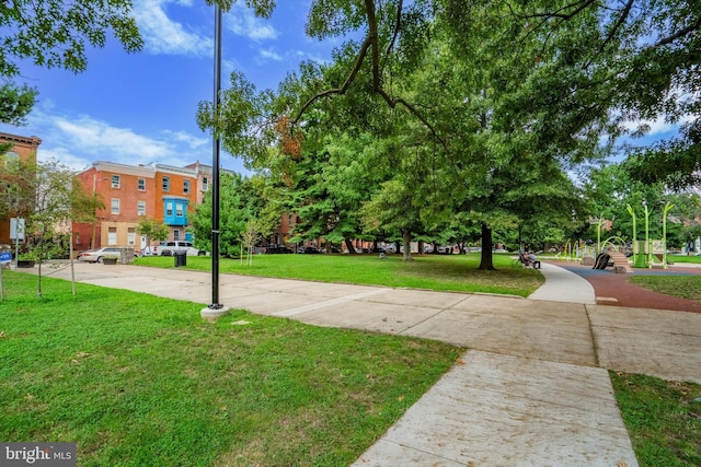 view of community featuring a yard