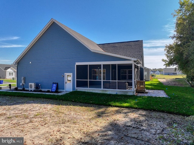 14274 Schooner Run Unit 83, Ellendale, DE 19941 - back of house featuring a sunroom, ac unit, and a lawn
