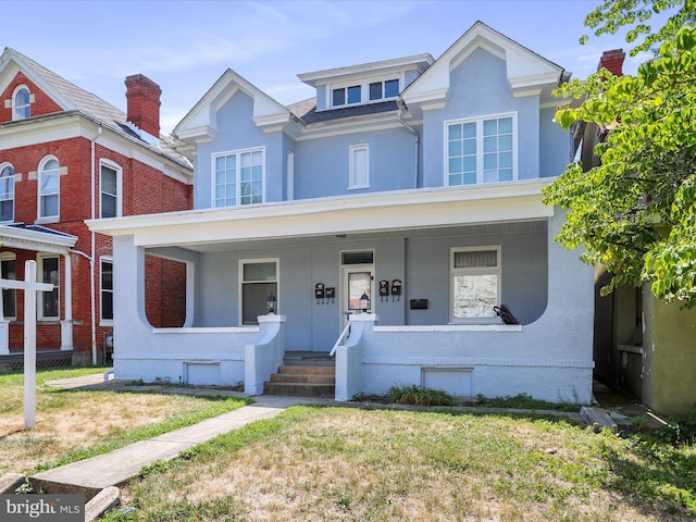 view of front of house featuring covered porch