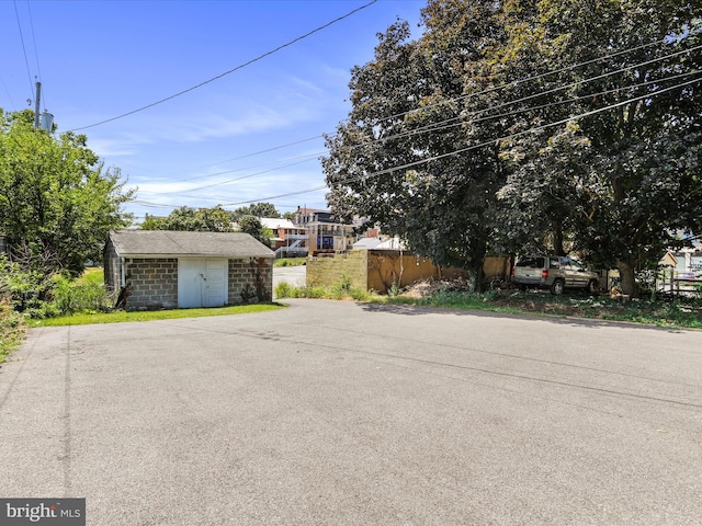 exterior space with a shed