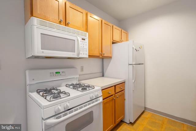 kitchen featuring white appliances