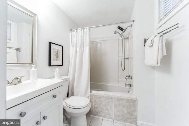 full bathroom featuring shower / bath combo with shower curtain, vanity, toilet, and tile patterned flooring