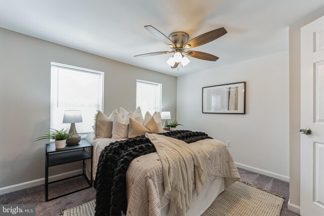 carpeted bedroom featuring ceiling fan