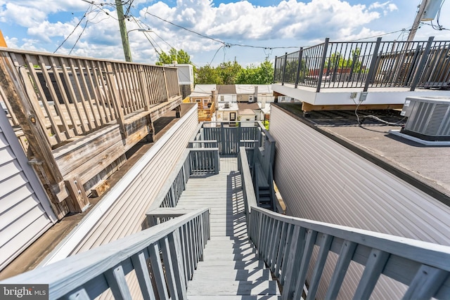 exterior space featuring central AC unit