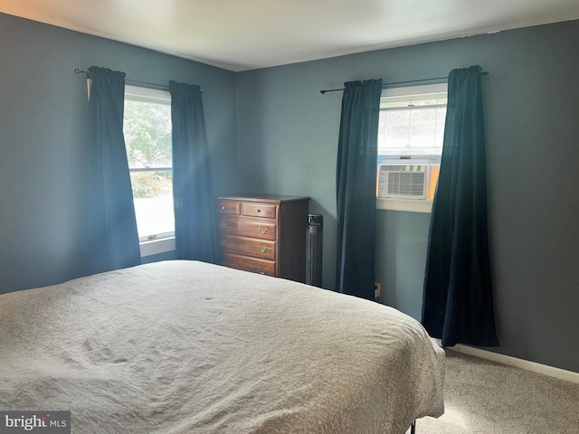 carpeted bedroom featuring cooling unit