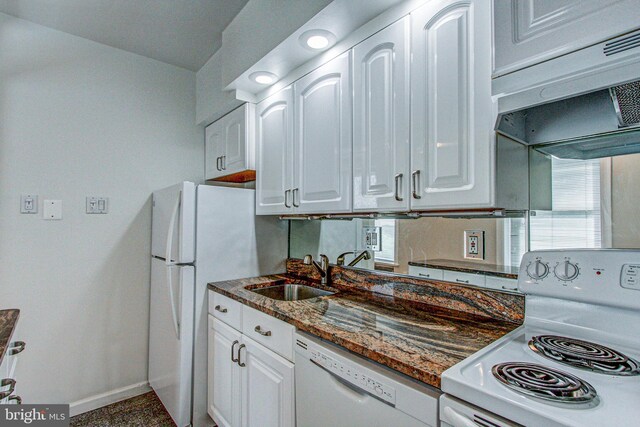 kitchen featuring sink, dishwasher, white cabinets, and stove