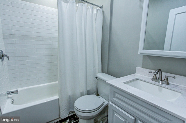 full bathroom featuring toilet, vanity, and shower / tub combo with curtain