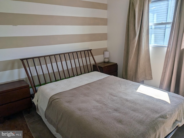 bedroom featuring dark hardwood / wood-style floors