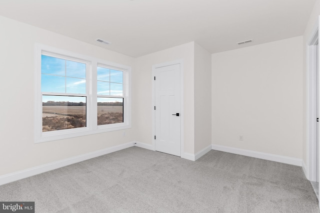 view of carpeted spare room