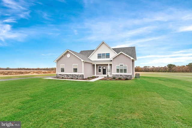 craftsman house with a front yard and covered porch