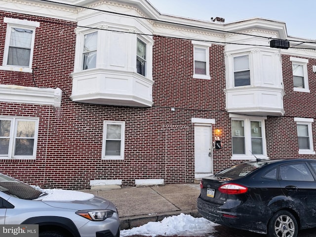 view of front of property with brick siding