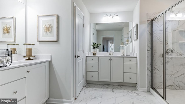 bathroom with tile patterned flooring, double vanity, and a shower with door