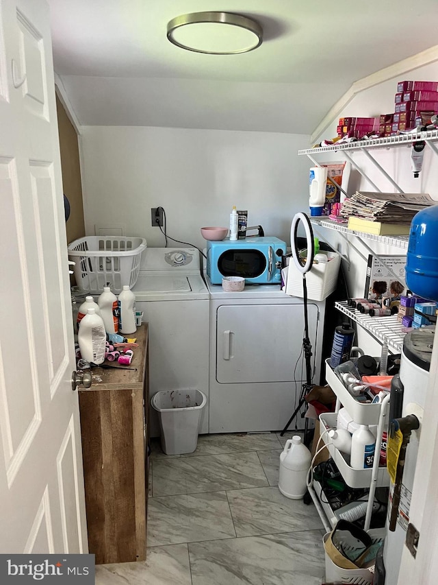 washroom featuring washing machine and dryer